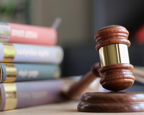 bigstock Wooden Judge Gavel And Stack O 465677067